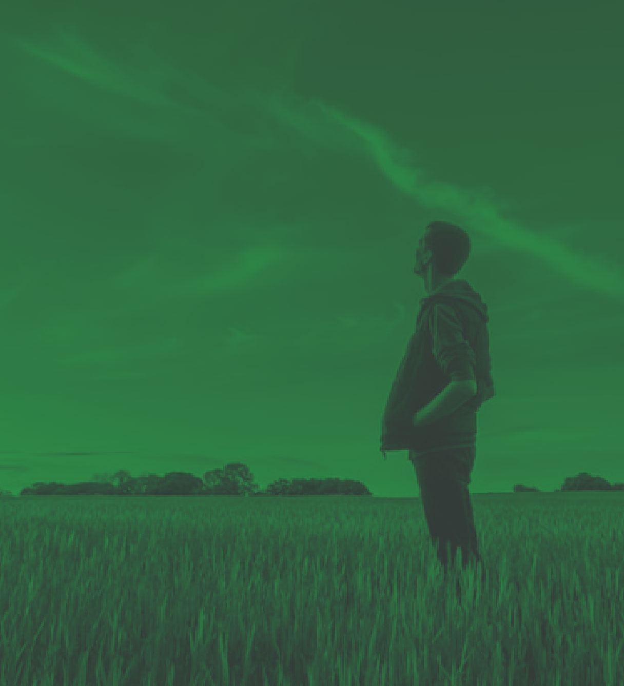 man standing in a field